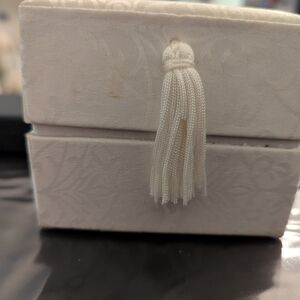 Elegant Cream Jewelry Box with Tassel